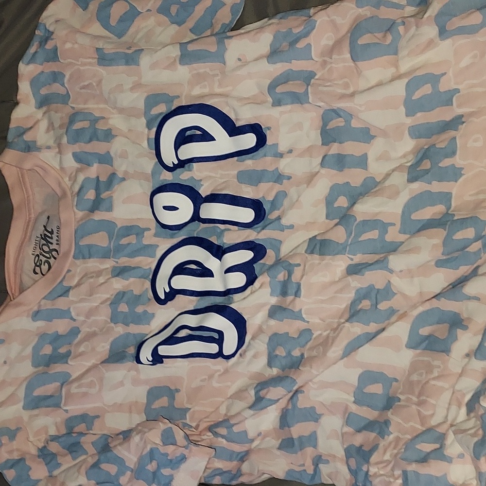 Brand new t-shirt. Size small pink, blue and white.